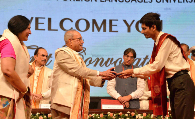 The President, Shri Pranab Mukherjee presenting the medal to a student, at the first convocation of The English &amp; Foreign Languages University, in Hyderabad on April 26, 2017.