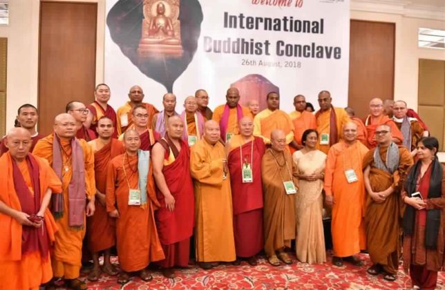 The Minister of Tourism, Uttar Pradesh, Prof. Rita Bahuguna Joshi with the delegates of the International Buddhist Conclave - 2018, at Varanasi, in Uttar Pradesh on August 26, 2018.