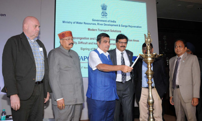The Union Minister for Road Transport & Highways, Shipping and Water Resources, River Development & Ganga Rejuvenation, Shri Nitin Gadkari lighting the lamp at the signing ceremony of an MoU between WAPCOs and M/s Doppelmayr, Austria for Modern Transport Solutions for Decongestion and Last Mile Connectivity in Urban Areas and Hilly, Difficult & Inaccessible Terrains, in New Delhi on November 05, 2018.