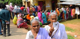 The elderly female voters displaying identity cards, at a polling booth, during the 1st Phase of General Elections-2019, at West Tripura on April 11, 2019.