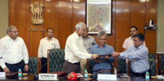 The Joint Secretary (NE) MHA, Shri Styendra Garg exchanging the files with the National Liberatin Front of Twipra (SD) representatives after Signing the Memorandum of settlement, in New Delhi on August 10, 2019.