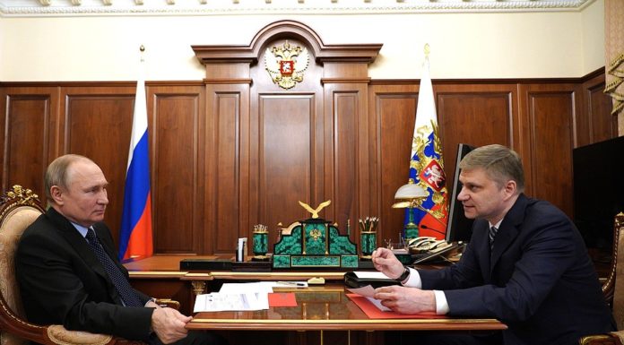 Vladimir Putin and Oleg Belozerov meeting