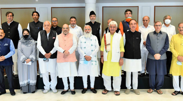 The Prime Minister, Shri Narendra Modi in a group photograph with the various political leaders from Jammu and Kashmir, in New Delhi on June 24, 2021.