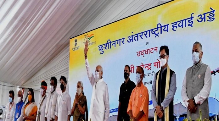 The Prime Minister, Shri Narendra Modi at the inauguration of the Kushinagar International Airport, Uttar Pradesh on October 20, 2021. The Governor of Uttar Pradesh, Smt. Anandiben Patel and other dignitaries are also seen.