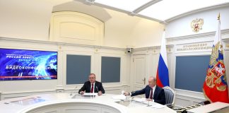 President Putin With VTB Bank President and Chairman of the Board Andrei Kostin during a plenary session of the Russia Calling! Investment Forum